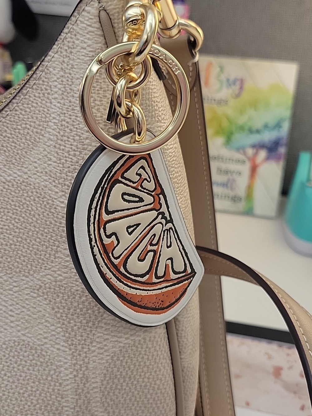Coach White and Orange Citrus Key Charm with Gold Hardware - Picture 6 of 6